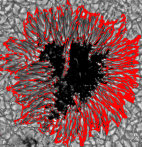 In rosso si evidenzia il flusso di gas all'interno della penombra - Credits: 